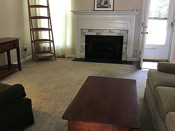 Den with gas fireplace