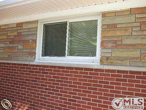 UPDATED WINDOW AND STONE TRIM