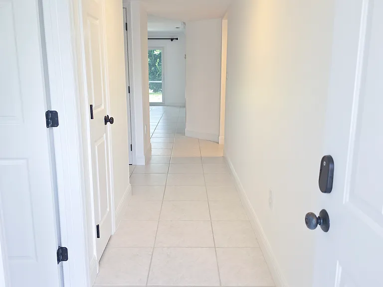 Front hall as you enter.