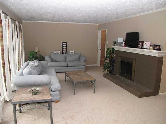 View of the Light & Bright Great Room with Fireplace.