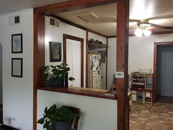Portion of Kitchen with Pass-Through from Living Room