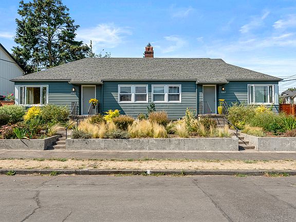 Full duplex on a corner lot with street parking