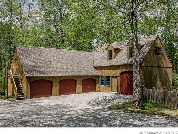 3 bay garage with huge unfi...