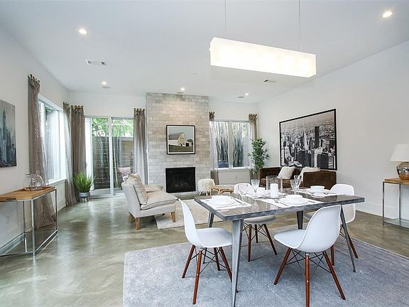 Beautiful concrete floors on the first level and a fireplace.
