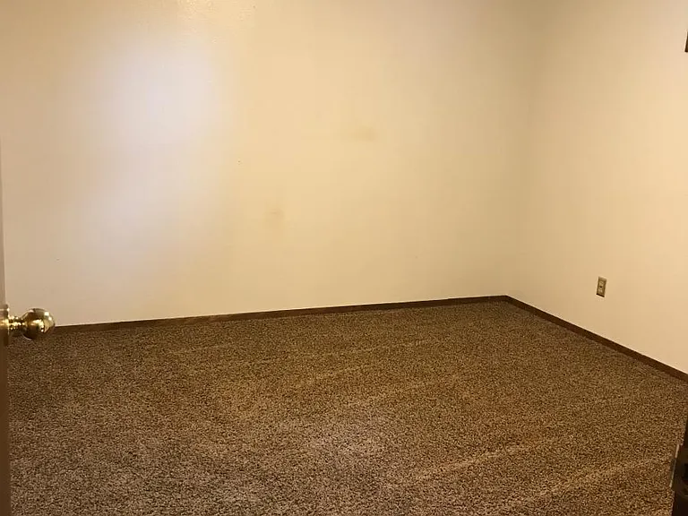 Basement Bedroom with Window and Large Closet