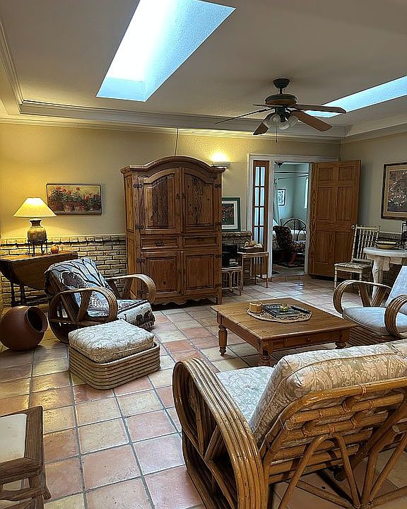 Open Living Room w/ Skylight