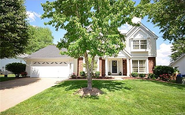 Great curb appeal, mature trees and tailored landscaping welcome you. You'll be proud to come home!