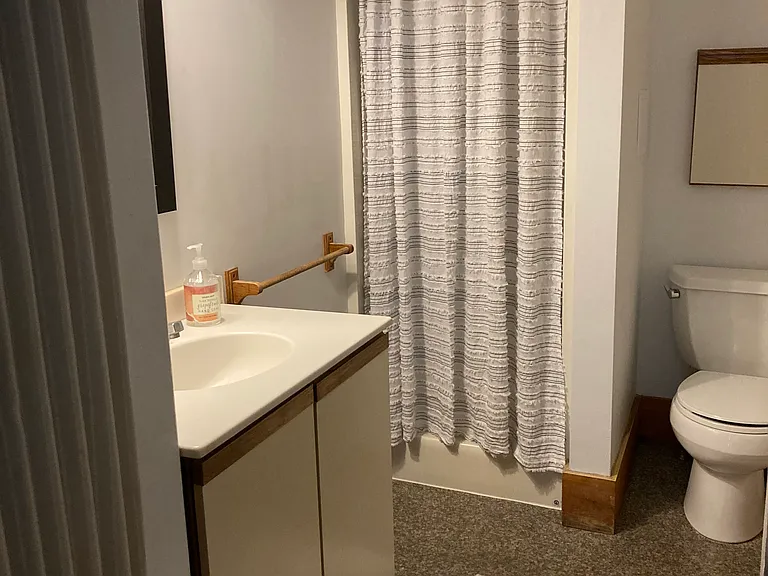 Bathroom has 2-means of egress, one from Bdrm and one from end of kitchen area