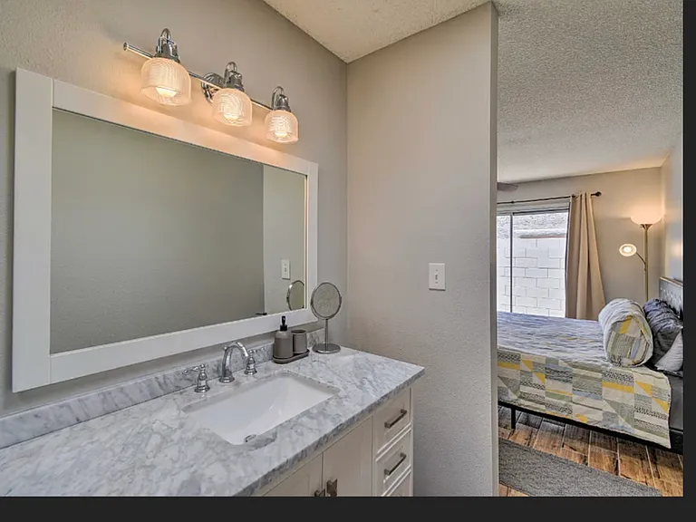 Master bathroom area / Master bedroom area with patio access