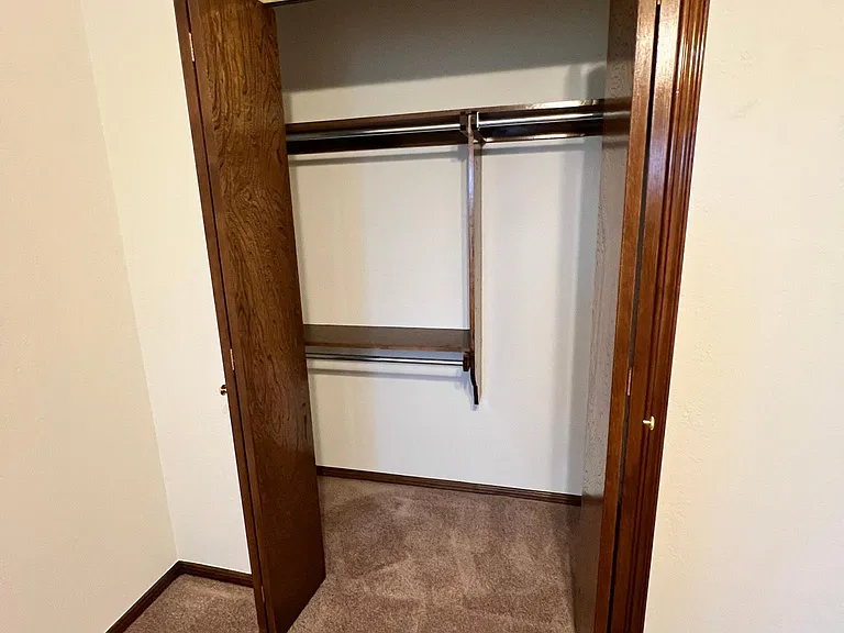All bedroom closets are arranged like this.