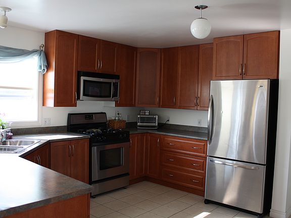 Kitchen with SS Appliances