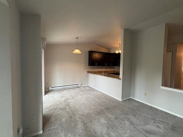 large living room for entertaining can hold sectional, sofa, entertainment center, chairs, etc.