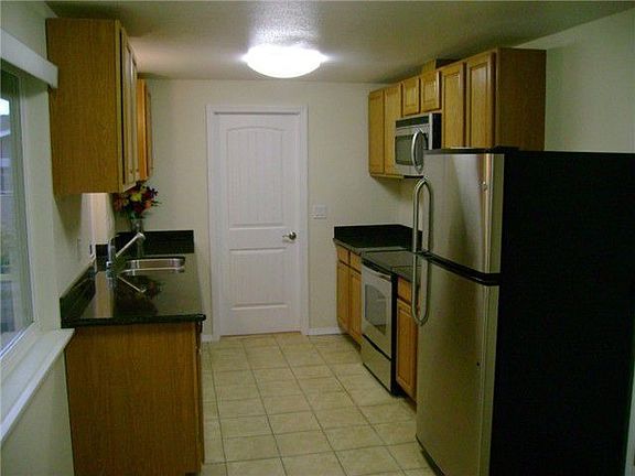 Kitchen with stainless steel appliances