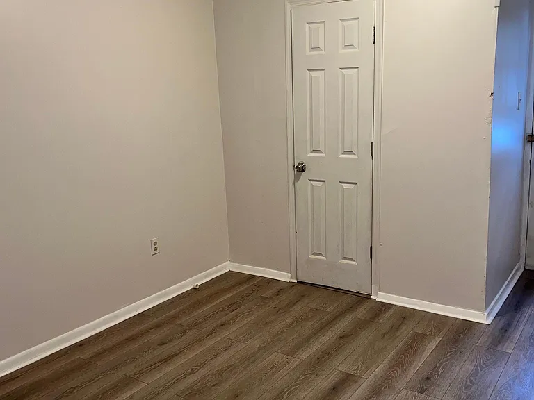 Pass the kitchen is the dining room and the half bath