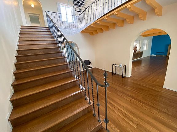 On stairs facing the living room