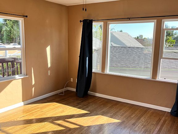 living room with fan.