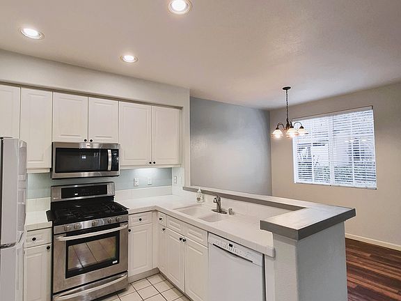 Kitchen - Refrigerator, Stove, Microwave, Dishwasher