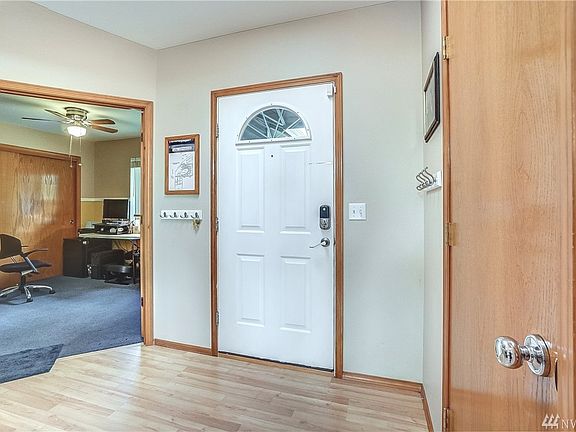 As you enter the home you are welcomed by a large foyer with easy care flooring.