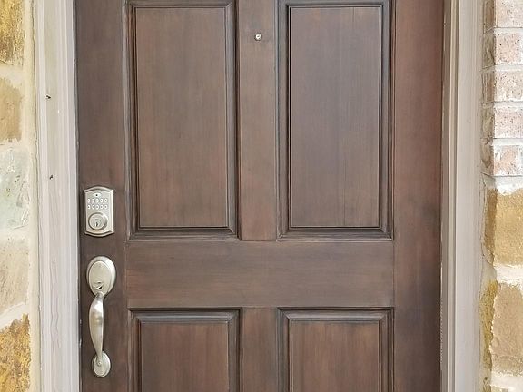 Automatic Front Door with Keyless Access. 
Just punch in the door code.