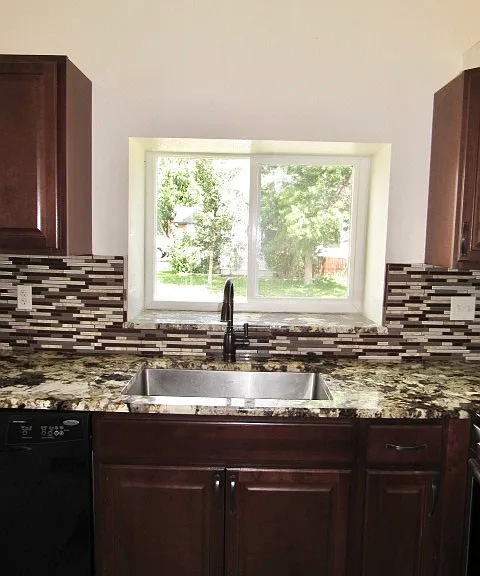 Watch the outside while doing the dishes.