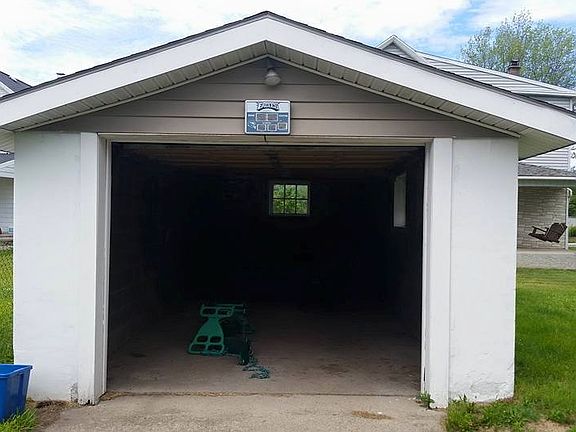 Parked in the driveway.