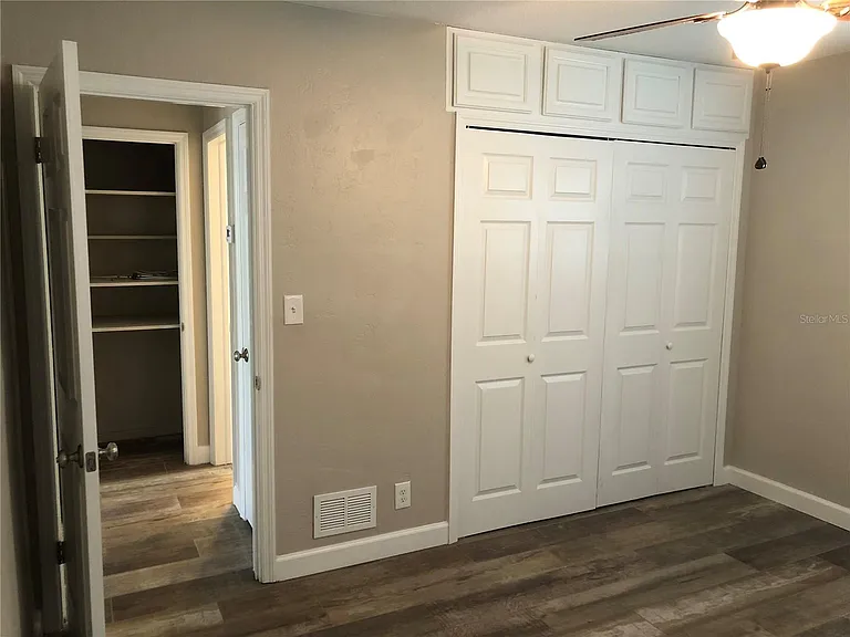 Spacious bedroom with built-in storage
