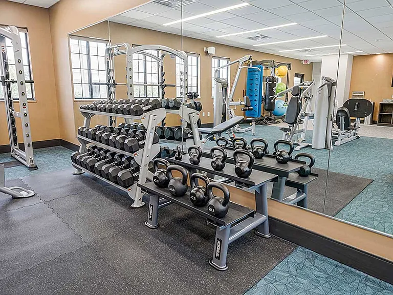 Choose from a variety of free weights in our fitness center.