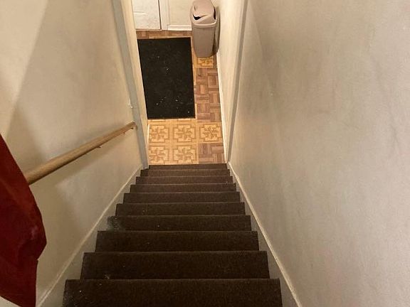 Looking from the living room to the entryway