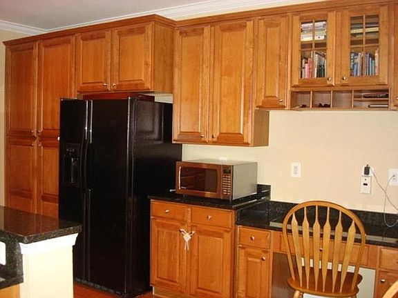 Larger, brand new high-end microwave in place now.