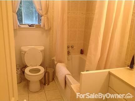 Main Bath
						:
						Top Floor. Show with Jacuzzi Tub