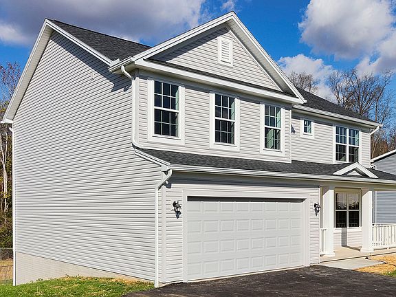 S A Homes Greenwood A floorplan - front exterior view - two story home with front porch, vinyl sidin