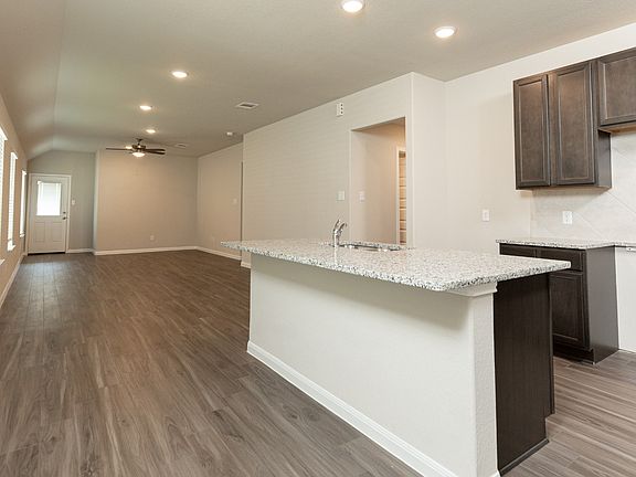 Dining Area to Kitchen and Family Room