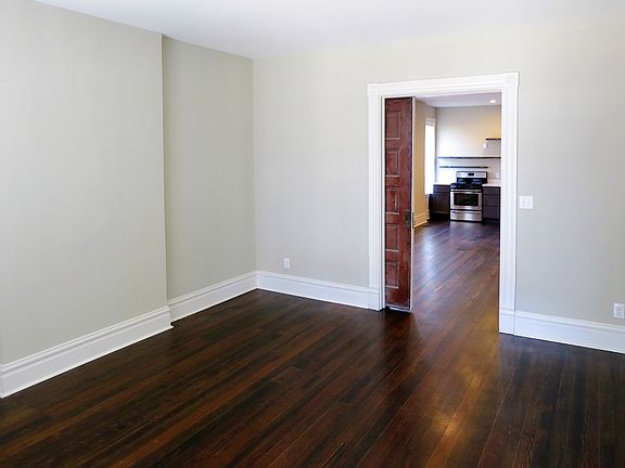 Front room is can be made private using the original pocket door