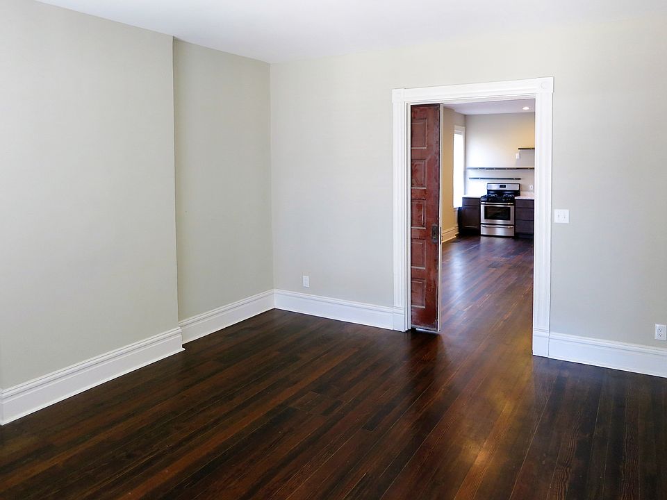 Front room is can be made private using the original pocket door