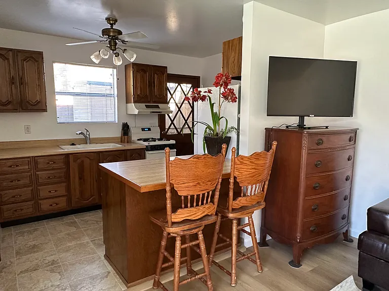 Kitchen includes pots, pans, dishes, glassware and utensils