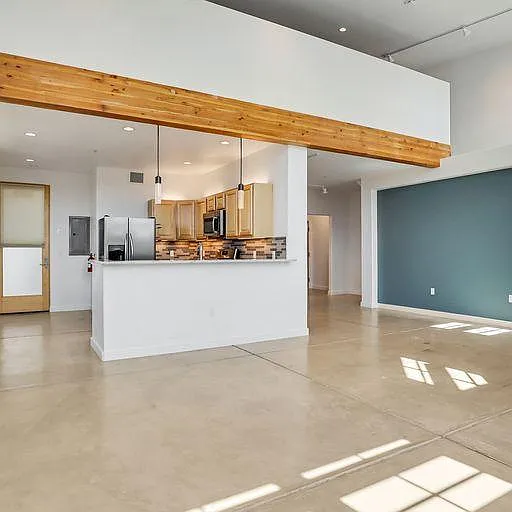 Lofts have open living plan.