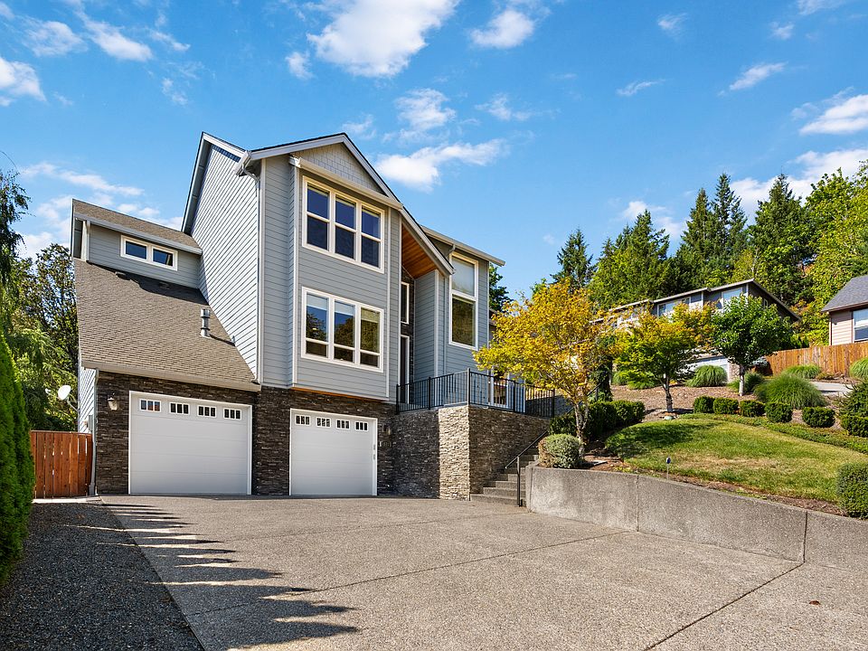 Flat driveway leads to the large two car garage.