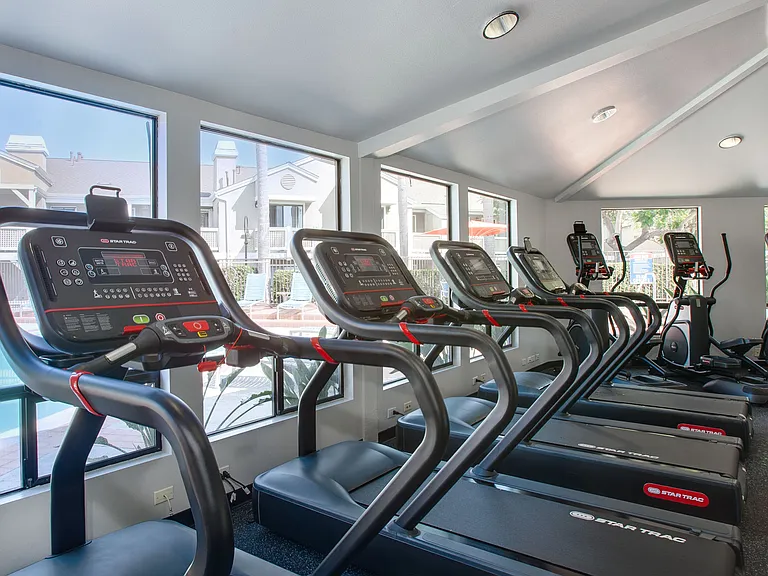 Cardio equipment, weight machines and free weights featured in our fitness center