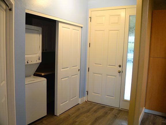 Washer & Dryer Closet with Ironing Table and Storage