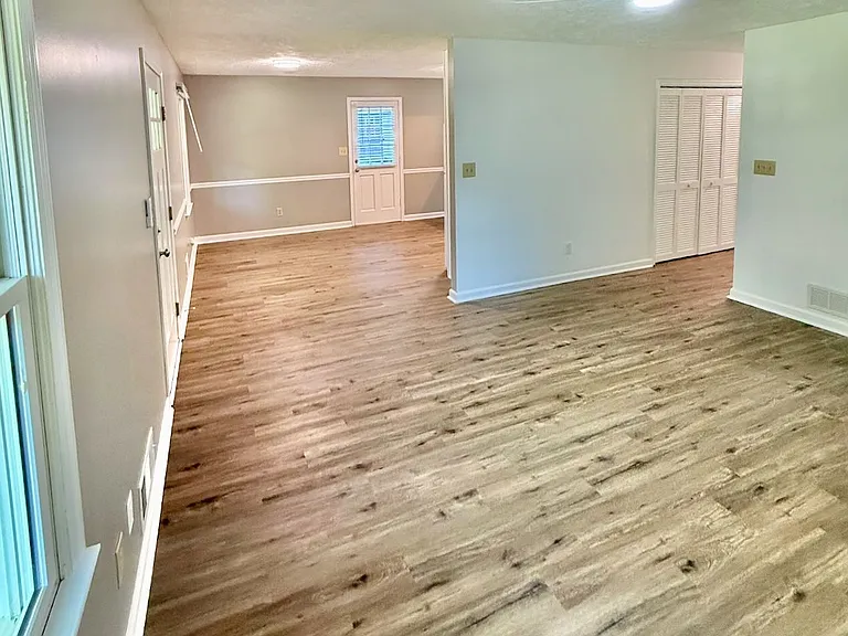 Fresh ceiling upgrade_ - new low-profile ceiling fan with LED light provides gentle air circulation and bright illumination - keeps living area comfortable year-round