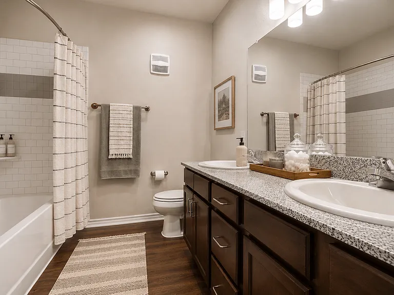 A clean, spacious bathroom with everyday functionality and contemporary finishes.