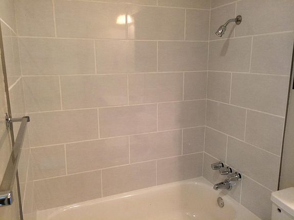 Tiled baths in both bathrooms