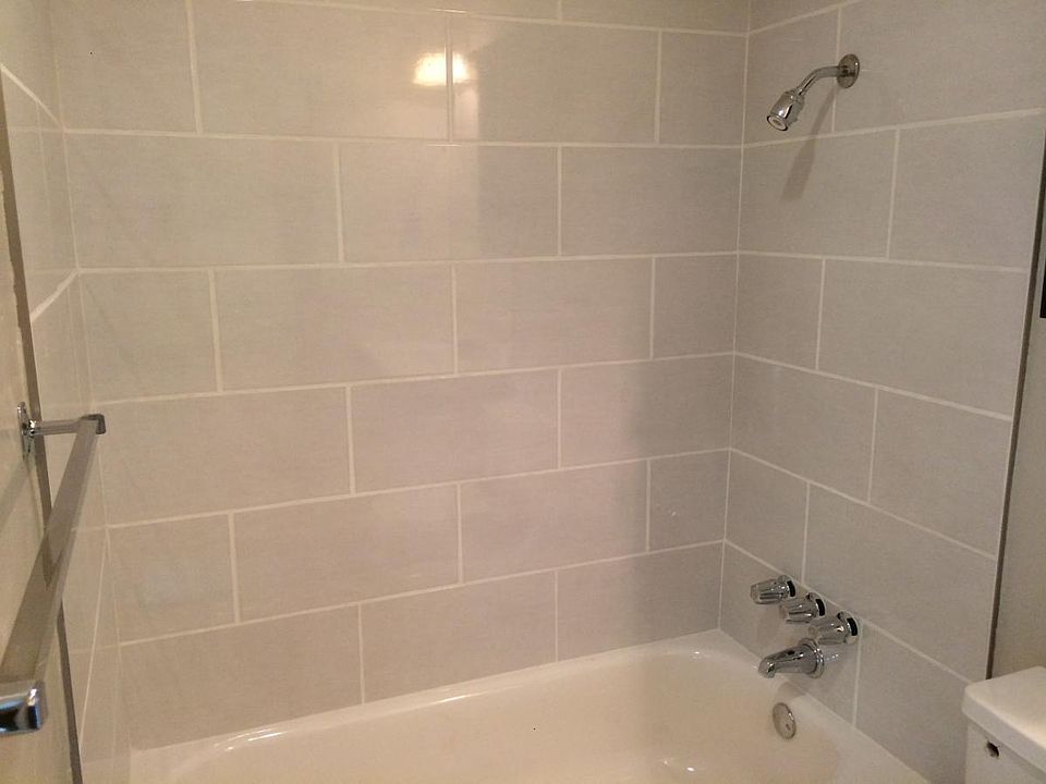 Tiled baths in both bathrooms