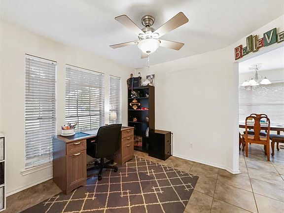 Working from home?! Formal office in the front of the home facing the street. This space is perfect for getting work done with a nice bright view out these great windows.