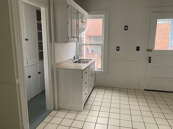 Bright kitchen with new appliances with a butler's pantry...lots of storage!