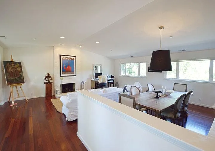 Formal living and dining with fireplace