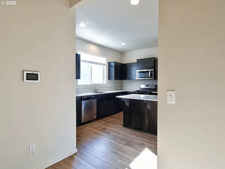 7751 NW Spirea St — Photo 8