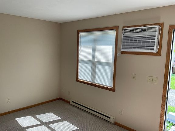 Living room with A/C unit