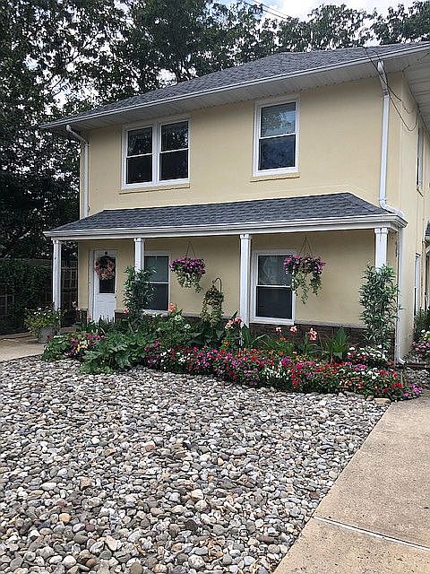 Front yard with 2 driveways