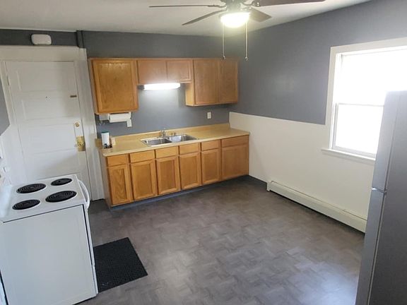 kitchen view facing entrance, from hallway